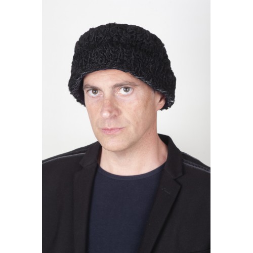 Black persian karakul fur hat. Hat with turned-up brim, double-sided fur